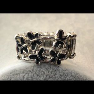 Silver ring with black butterflies